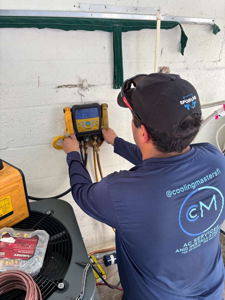 Cooling Masters technician running advanced AC diagnostics