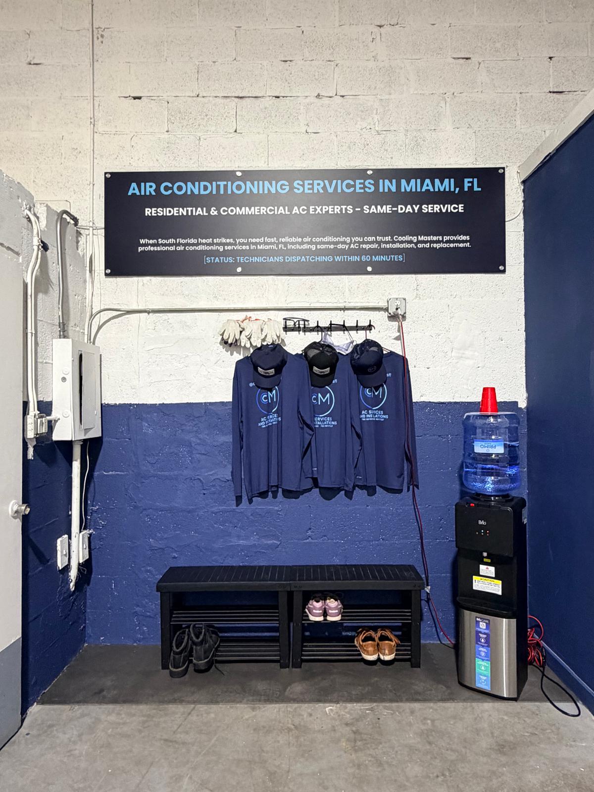 Cooling Masters technician uniforms and dispatch wall signage
